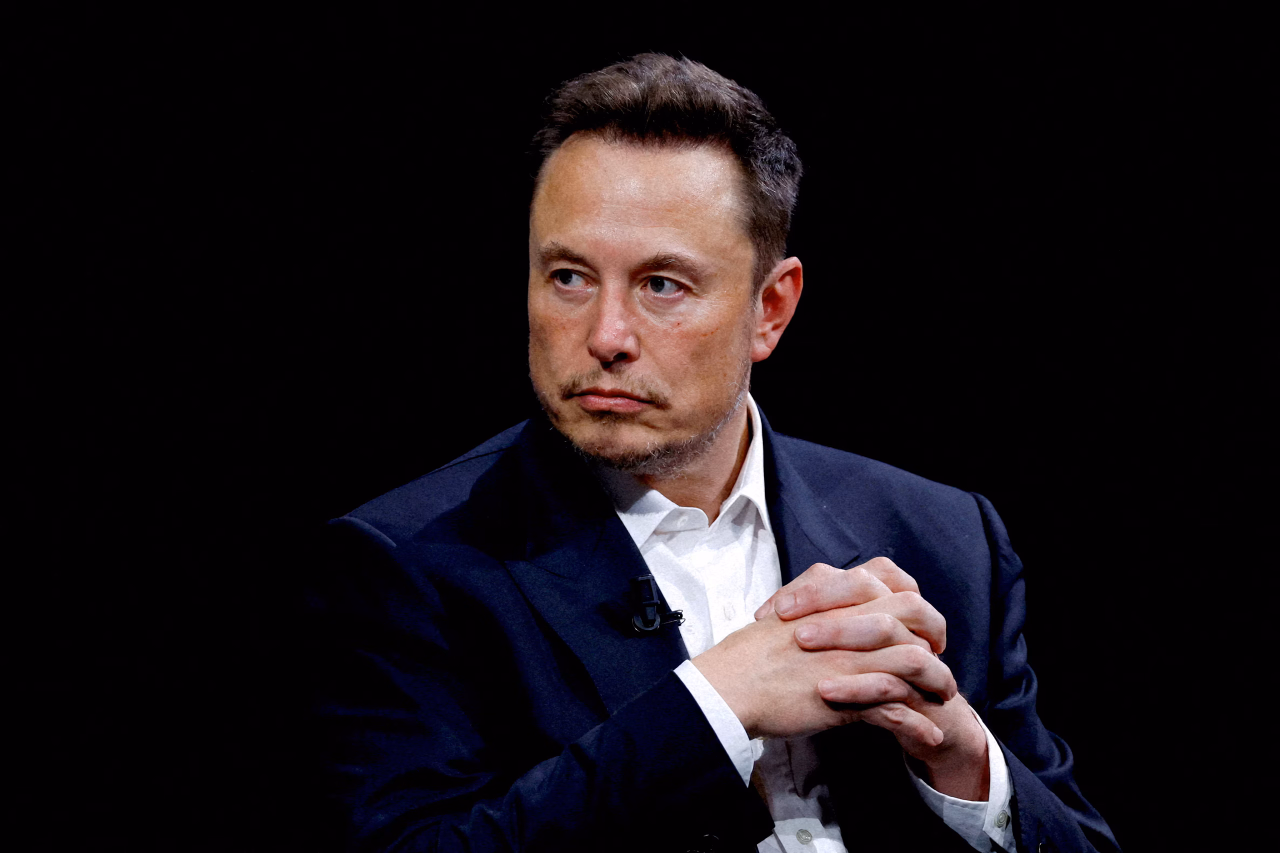 Tesla CEO Caught in Trade Crossfire as Fortune Sinks Under $300 Billion